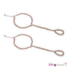 Load image into Gallery viewer, A set of barefoot sandals in the most delicate pink pearls. A beautiful welcome present for any little girl and the ideal accessory for pool party or when out at the beach. Send in your baby's feet measurements and we would be happy to customize.