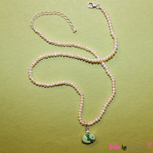 Load image into Gallery viewer, Sterling Silver Bunny Rabbit pendant in light and dark green on a delicate string of tiny white freshwater pearls. Set with a sterling silver fastening and adjustable chain of 2" to increase length to 16".