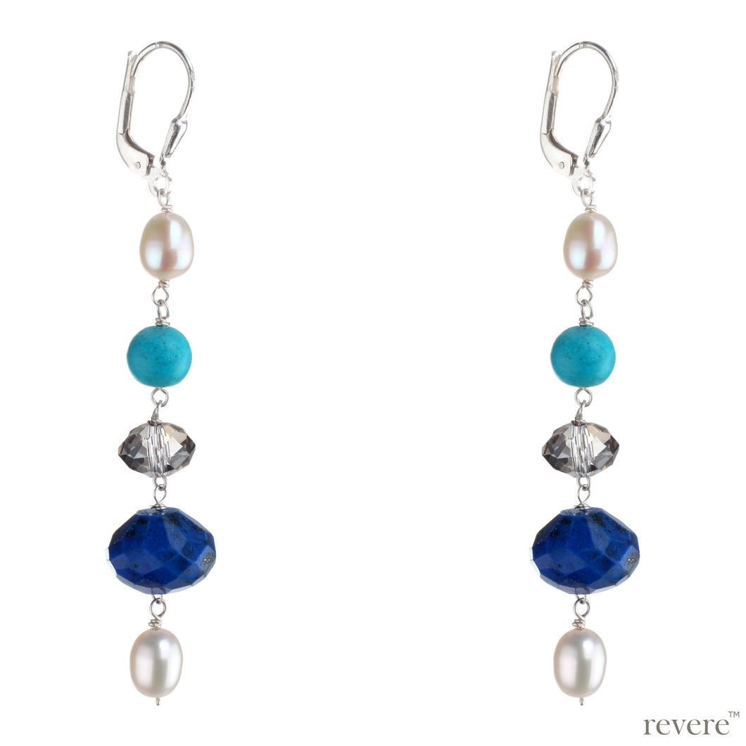 Mediterranean earrings feature a delicate design in sterling silver stringing together freshwater pearls with turquoise howlite, glass crystal and gemstone lapis lazuli. An elegant accessory for anytime wear.