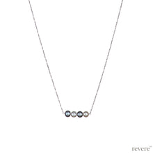 Load image into Gallery viewer, "Moonbeam" features white and grey freshwater pearls secured on a delicate sterling silver chain with rhodium plating. Subtle yet sophisticated.