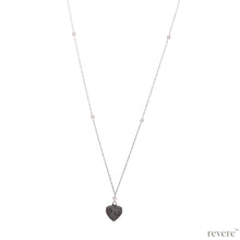 Load image into Gallery viewer, Intense Necklace..depicted by the timeless symbol of love.. a heart..draped on a long beautiful sterling silver chain studded with white pearls.. A timeless classic indeed.