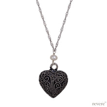 Load image into Gallery viewer, Intense Necklace..depicted by the timeless symbol of love.. a heart..draped on a long beautiful sterling silver chain studded with white pearls.. A timeless classic indeed.