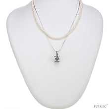Load image into Gallery viewer, Dive into the magical temptation of this stunning Budhhist box pendant in attractive design made of sterling silver.The neckpiece features a 2 strand design, one strand of white pearls and a second of sterling silver chain and a beautiful Budhhist pendant in sterling silver.