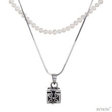 Load image into Gallery viewer, Dive into the magical temptation of this stunning Budhhist box pendant in attractive design made of sterling silver.The neckpiece features a 2 strand design, one strand of white pearls and a second of sterling silver chain and a beautiful Budhhist pendant in sterling silver.