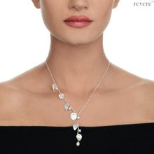 Load image into Gallery viewer, "Harmony" features scratch design sterling silver leaves with white freshwater pearls transformed into an elegant branch. Sure to enhance any outfit anytime of the day!