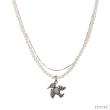 Load image into Gallery viewer, "Dido" means bird and features a 2 strand design, one strand of white pearls and a second of sterling silver chain and a beautiful bird pendant in sterling silver.