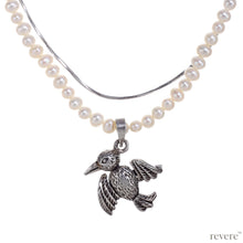 Load image into Gallery viewer, &quot;Dido&quot; means bird and features a 2 strand design, one strand of white pearls and a second of sterling silver chain and a beautiful bird pendant in sterling silver.
