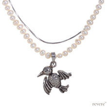 Load image into Gallery viewer, "Dido" means bird and features a 2 strand design, one strand of white pearls and a second of sterling silver chain and a beautiful bird pendant in sterling silver.