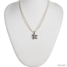 Load image into Gallery viewer, "Dido" means bird and features a 2 strand design, one strand of white pearls and a second of sterling silver chain and a beautiful bird pendant in sterling silver.