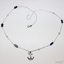 Load image into Gallery viewer, Be near the Sea always..with the Seafarer necklace featuring a hand crafted sterling silver anchor and scattered freshwater pearls and sea blu lapis lazuli gemstones on a sterling silver chain.. Instant coolness! 
