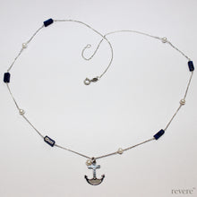 Load image into Gallery viewer, Be near the Sea always..with the Seafarer necklace featuring a hand crafted sterling silver anchor and scattered freshwater pearls and sea blu lapis lazuli gemstones on a sterling silver chain.. Instant coolness!
