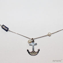 Load image into Gallery viewer, Be near the Sea always..with the Seafarer necklace featuring a hand crafted sterling silver anchor and scattered freshwater pearls and sea blu lapis lazuli gemstones on a sterling silver chain.. Instant coolness!