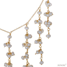 Load image into Gallery viewer, "Kamaa" features small yet delicate white freshwater pearl clusters inter-woven with links of 18k gold plated sterling silver on a sterling silver chain also with 18k gold plating. Poetic in disposition with a luxurious feel. Goes well with our Moksha earrings.