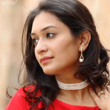 Load image into Gallery viewer, A sterling silver tear drop cradling a high lustre pristine white fresh water pearl. Simple and elegant.