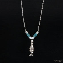 Load image into Gallery viewer, An elegantly hand crafted sterling silver pendant of a fish decorated with pearl and aventurine gemstone on a long sterling silver chain, makes up the "Seine" necklace.