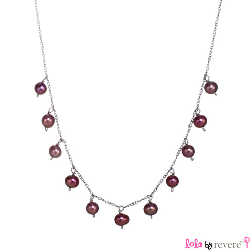 Metallic red freshwater pearls delicately scattered on a sterling silver chain with rhodium plating. Ideal pearls for a 13th or 16th birthday present.