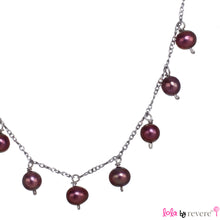Load image into Gallery viewer, Metallic red freshwater pearls delicately scattered on a sterling silver chain with rhodium plating. Ideal pearls for a 13th or 16th birthday present.
