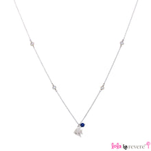 Load image into Gallery viewer, Sterling Silver Chain with two overlapping delicate fish on a sterling silver pendant embellished with small freshwater white pearls and lapis lazuli representing the colours of the sea. The chain measures 14&quot; with an adjustable chain of 1&quot; to increase length to 15&quot;.
