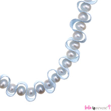 Load image into Gallery viewer, Delicate freshwater water pearls woven into satin ribbon for a royal yet dainty effect. This piece measures 12&quot; around the neck and has 4&quot; ribbon tie on each side.
