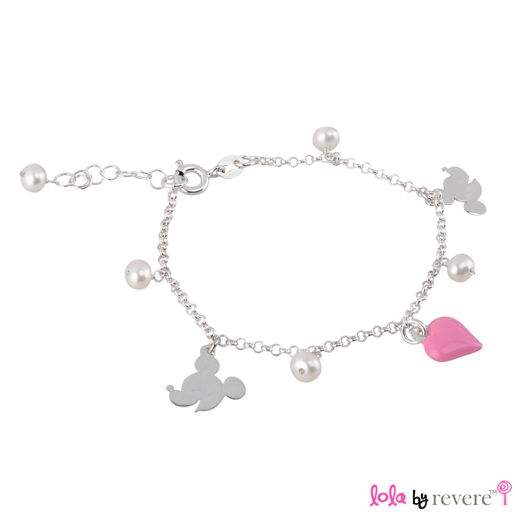 A sterling silver charm bracelet with white pearls, minnie mouse and a pink heart. Some girls get to have all the fun!Measures 6
