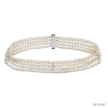 Load image into Gallery viewer, Regalia features multiple strands of hand selected white freshwater pearls. The pearl choker is a timeless classic. 
