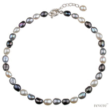 Load image into Gallery viewer, An eye catching piece hand crafted out of high lustre baroque pearls in metallic grey contrasted with warm whites, fastened by a sterling silver clasp with a 2 inch adjustable chain.
