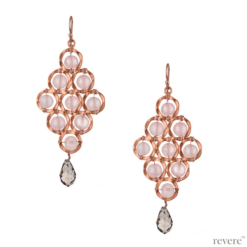 Featuring classy shine and flawless finish, this elegant geometric design earring in stunning rose gold tone with pink rose quartz and glass crystal adornment makes a perfect indulgence!