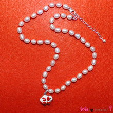 Load image into Gallery viewer, White pearls handknotted in red thread to perfectly compliment the red and white sheep pendant in sterling silver. Measures 14&quot; with an adjustable chain of 2&quot; to increase length to 16&quot;. Pretty and fun!
