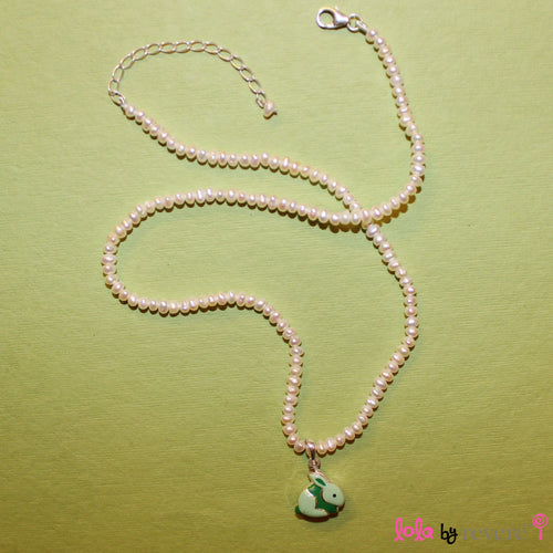 Sterling Silver Bunny Rabbit pendant in light and dark green on a delicate string of tiny white freshwater pearls. Set with a sterling silver fastening and adjustable chain of 2