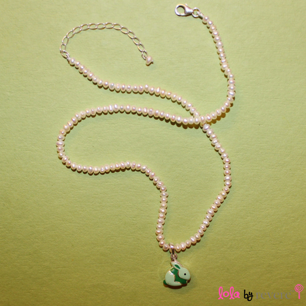 Sterling Silver Bunny Rabbit pendant in light and dark green on a delicate string of tiny white freshwater pearls. Set with a sterling silver fastening and adjustable chain of 2