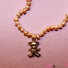 Load image into Gallery viewer, Handknotted pink pearls with the most huggable sterling silver teddy  bear pendant. A darling gift for any little girl. The closest thing to hugs!
