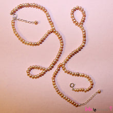 Load image into Gallery viewer, A set of barefoot sandals in the most delicate pink pearls. A beautiful welcome present for any little girl and the ideal accessory for pool party or when out at the beach. Send in your baby&#39;s feet measurements and we would be happy to customize.
