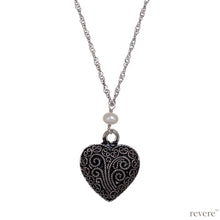 Load image into Gallery viewer, Intense Necklace..depicted by the timeless symbol of love.. a heart..draped on a long beautiful sterling silver chain studded with white pearls.. A timeless classic indeed.

