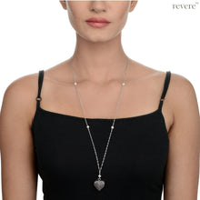 Load image into Gallery viewer, Intense Necklace..depicted by the timeless symbol of love.. a heart..draped on a long beautiful sterling silver chain studded with white pearls.. A timeless classic indeed.
