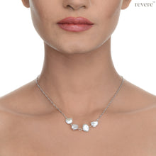 Load image into Gallery viewer, Elegant white keshi cultured freshwater pearls set in 925 sterling silver. &quot;Drops of Jupiter&quot; is the necklace of choice to lift you up anytime... at work or play!
