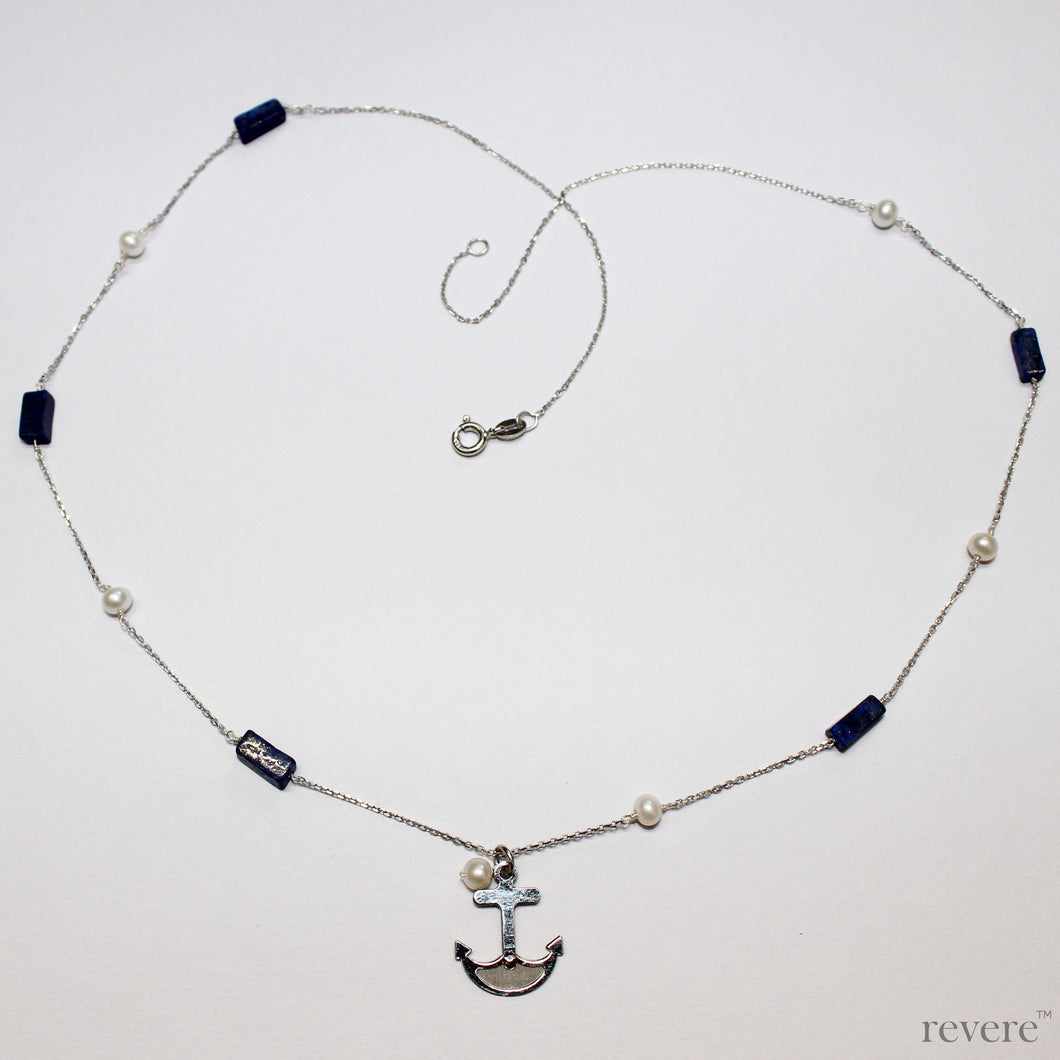 Be near the Sea always..with the Seafarer necklace featuring a hand crafted sterling silver anchor and scattered freshwater pearls and sea blu lapis lazuli gemstones on a sterling silver chain.. Instant coolness! 