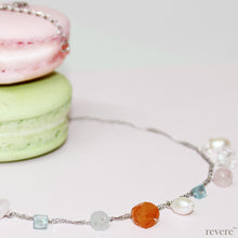 Load image into Gallery viewer, Felicity features drops of pearl, crystal, rose quartz, apatite, green aventurine, cornaline on sterling silver with an extendable chain, rhodium plated.
