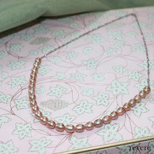 Load image into Gallery viewer, Pink pearls with a twist of sterling silver.. It surprises you..&quot;Perfection&quot; is just that..
