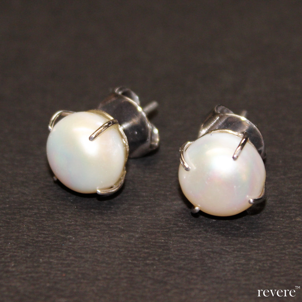 Flawless large single fresh water pearls on sterling silver.. the resonance earrings are a perennial must have in every jewellery box.