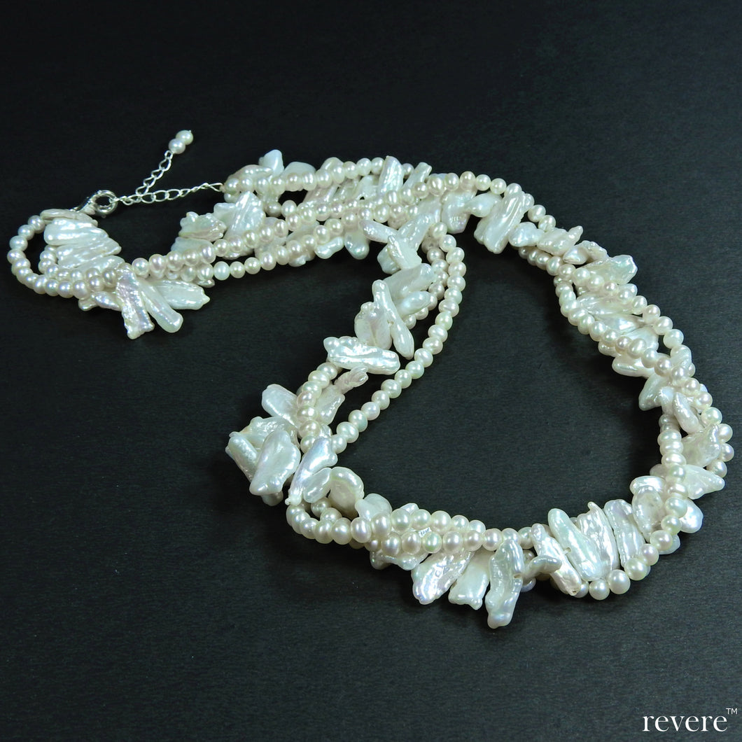 empress white AAA grade cultured fresh water biwa pearls and semi round pearls necklace, 3 string intertwined design, suitable for any formal attire, afternoons or evenings out.